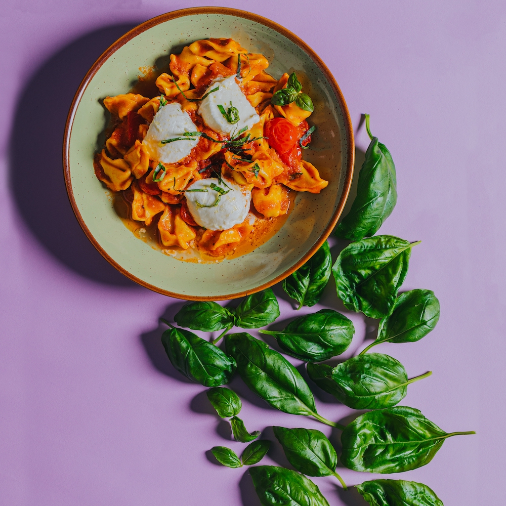 flat-lay-pasta-with-burrata-on-top-and-basil-leave-2021-11-05-18-24-58-utc